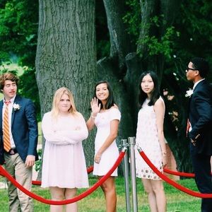 White mini dress slightly off the shoulder